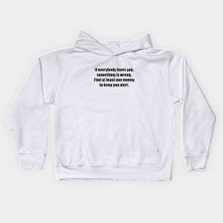 If everybody loves you, something is wrong. Find at least one enemy to keep you alert. Kids Hoodie